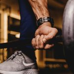 person about to lift barbell